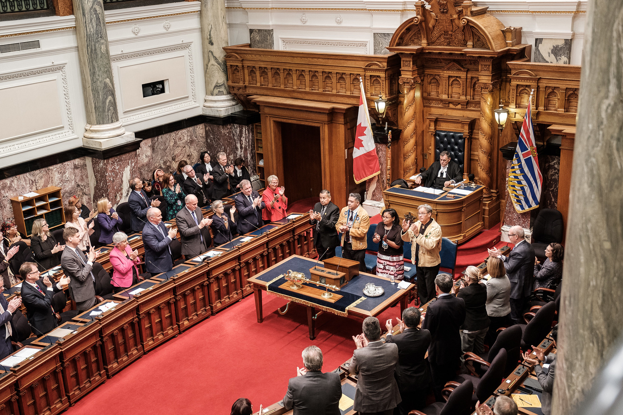 A full BC legislature stands and applauds